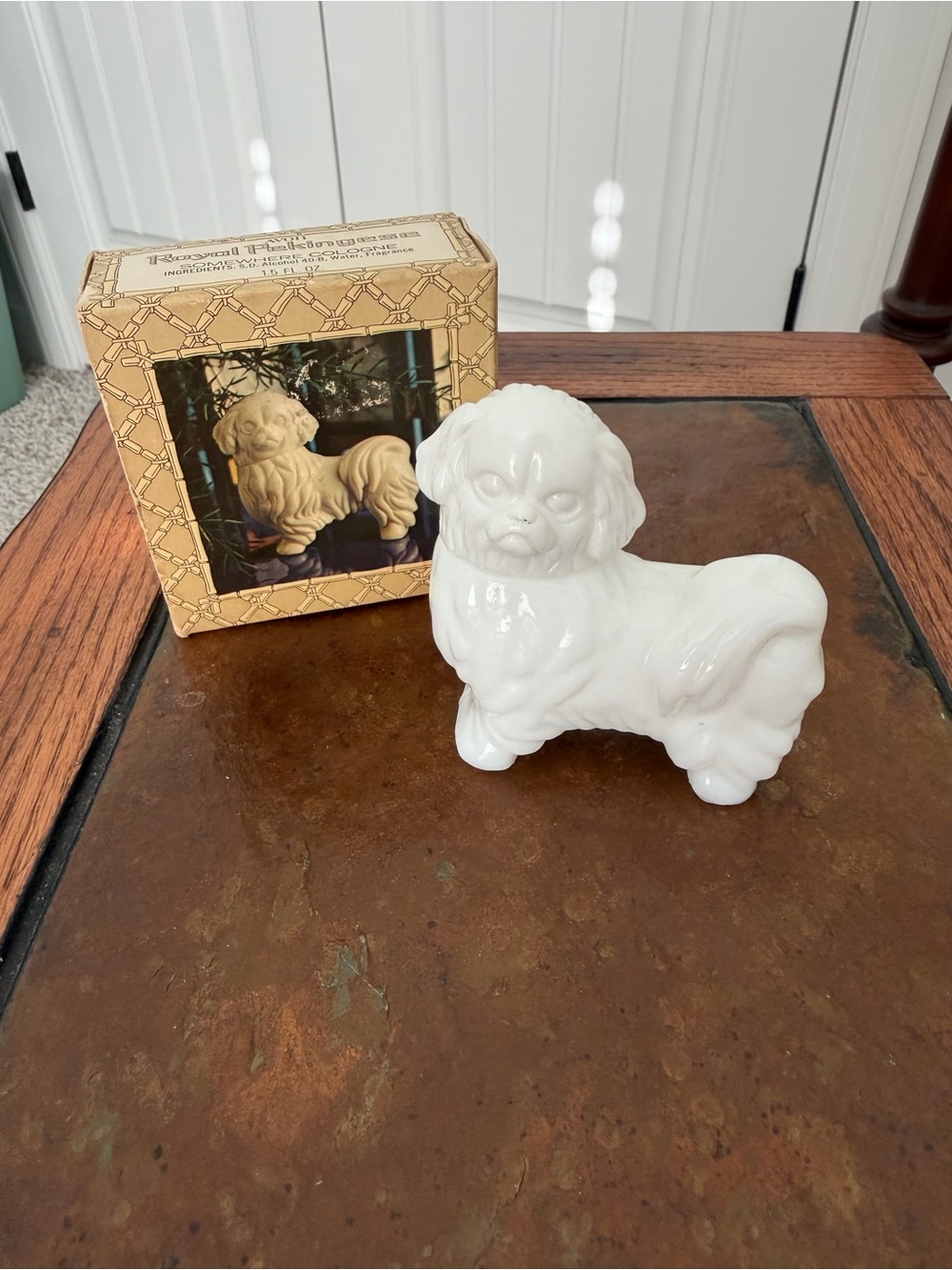 Vintage Collectible Avon White Ceramic Pekingese Dog perfume bottle. Empty